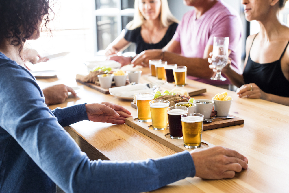 Friends with beer flights