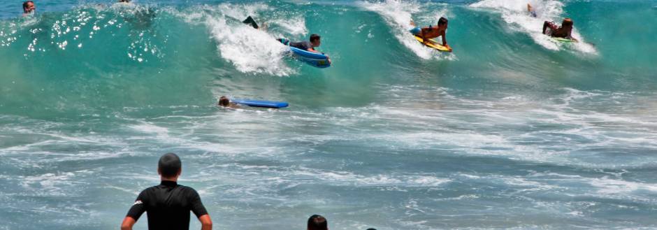 kids surfing in kauai